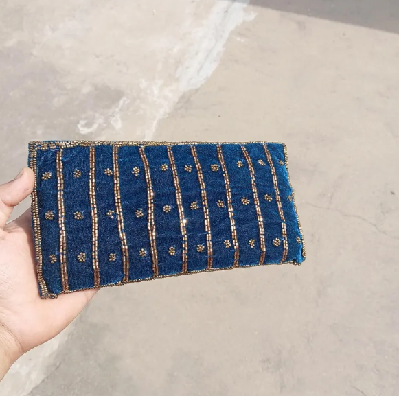 Blue velvet beaded clutch bag