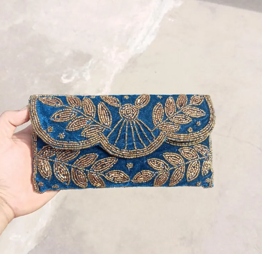 Blue velvet beaded clutch bag